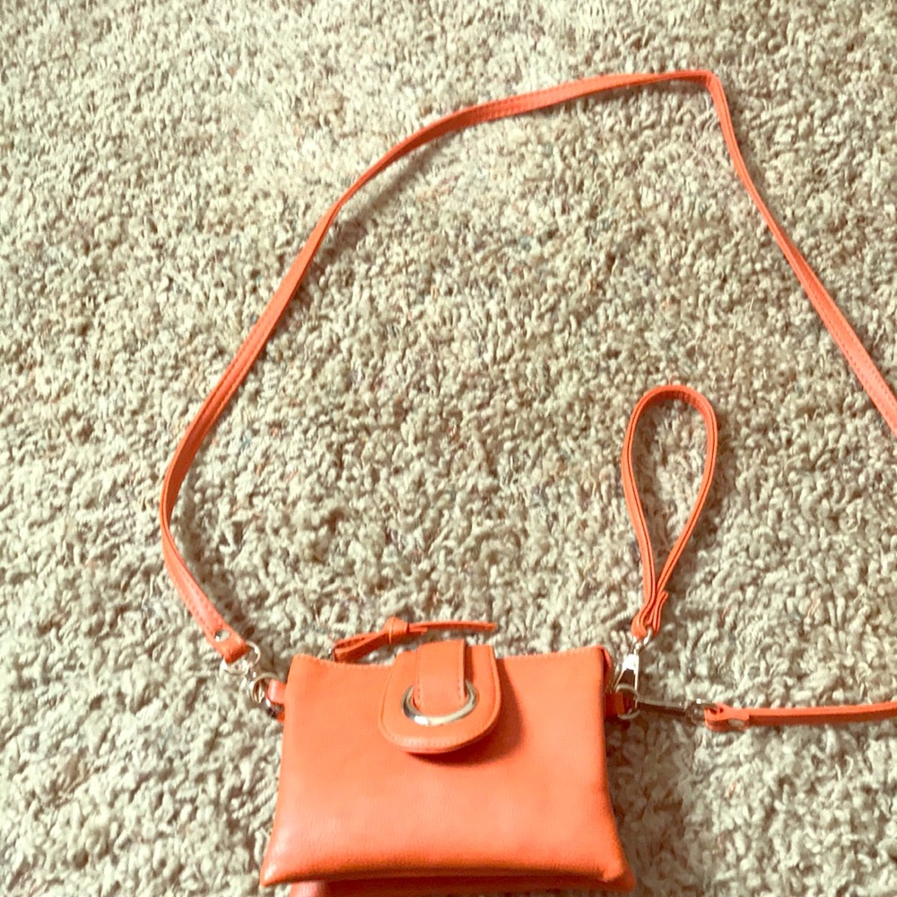 Charming Charlie cross body /wristlet